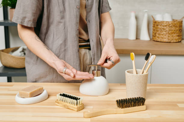istock Woman applying liquid soap on hands 1327817802