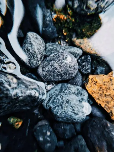 Close-up view of stones in river