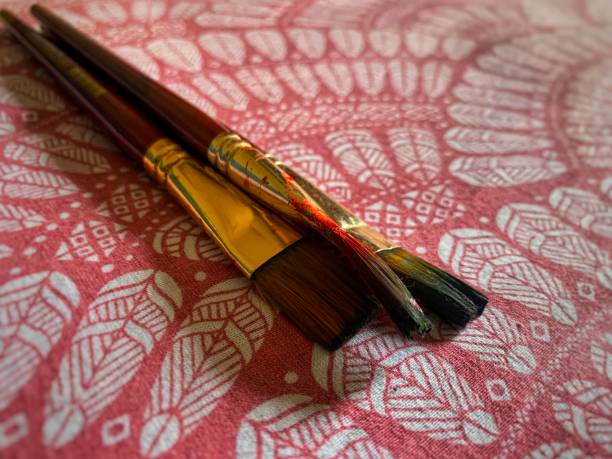 istock A set of artists brush on a coloured designed tablecloth. 1327822992