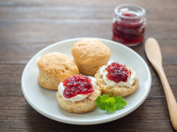 istock Scones with clotted cream and jam 1327825819