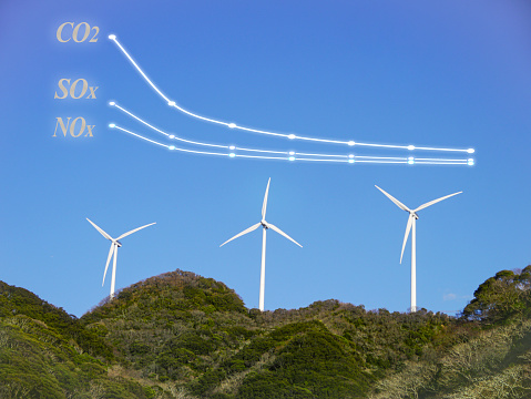 Three wind power generators image representing the contribution of wind power generators in reducing air pollution.