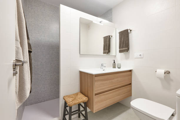 istock Modern bathroom interior with shower and sink. Decoration 1327828036