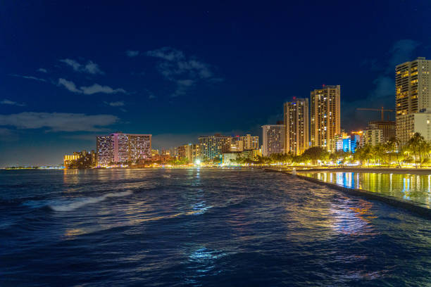 istock Night scene at Waikiki Beach skyline - Oahu, Hawaii 1327828619