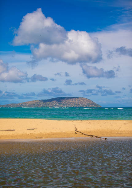Walking on an empty Kahala Beach in Oahu, Hawaii