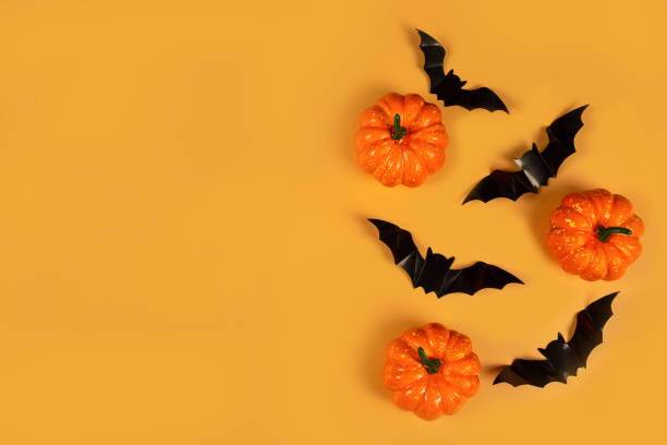 istock halloween on orange background. Special offer symbol. Celebration concept. 1327839927