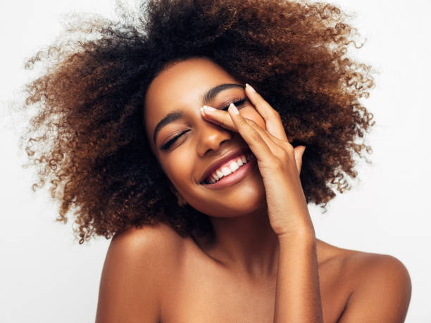 istock Beautiful smiling girl with curly hairstyle 1327841023