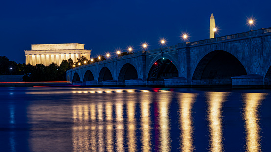 View of the Arlington Memorial Bridge and the Lincoln Memorial illuminated at night