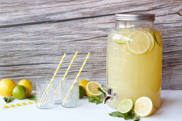 istock Fresh lemonade with lemons and lime in the beverage dispenser 1327853208