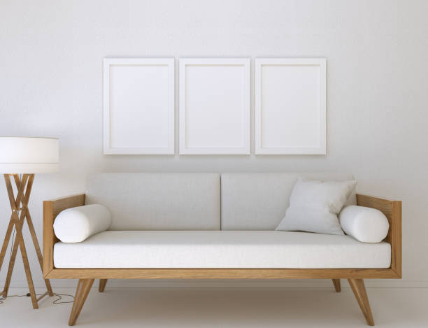 istock 3D Illustration. Mockup of three blank poster frames hanging on the wall. 1327856812