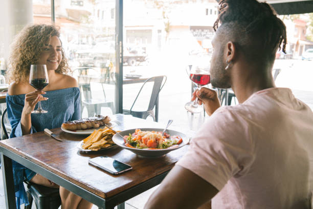 istock Young couple having a date at a restaurant. 1327857780
