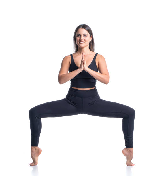 istock Yoga instructor demostrates a pose 1327860598