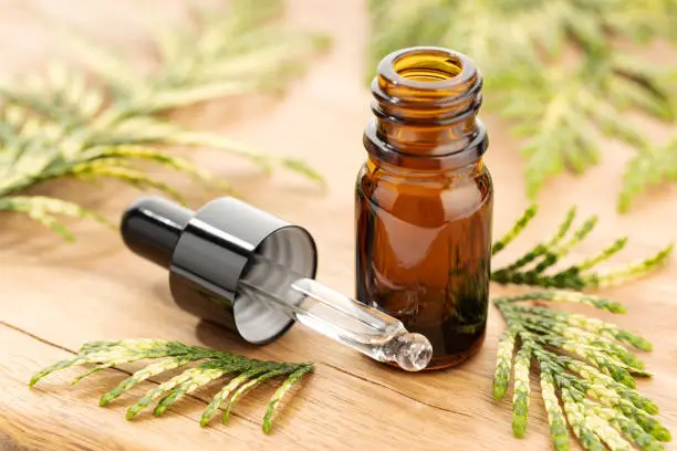 Photo of Cypress essential oil bottle
