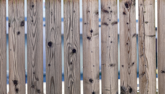 Old wooden barn fence for winter wind protection in central Montana, in western USA of North America.