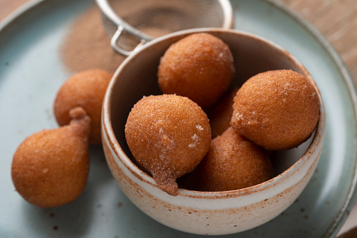 Bolinho de chuva (Rain dough) is a popular homemade dessert in Brazil. Its recipe came from Portugal, and It is made from sugar, flour, and eggs, the dumplings are deep fried and sprinkled with cinnamon and sugar.