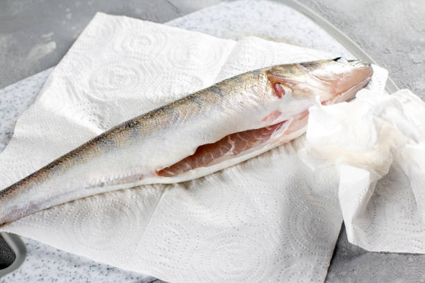 istock Fresh peeled fish ready to cook. Fresh pike perch 1327868791
