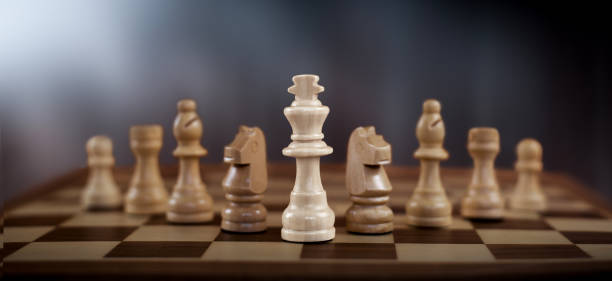 istock chess pieces are placed on the chessboard. business strategy concept. Teamwork. 1327870978