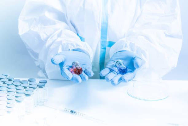 Different Covid 19 vaccines presented by laboratory scientist nurse. Various coronavirus vaccine choice. Pandemic prevention and immunization. Doctor in ppe shows vaccination research.