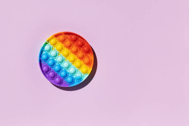 istock Antistress pop it toy rainbow circle purple 1327875391