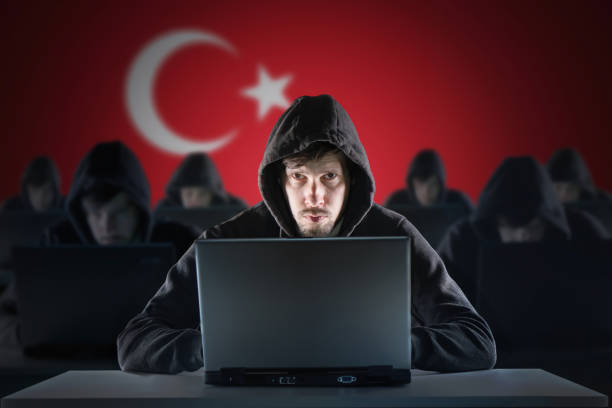 istock Many Turkish hackers. Turkey flag in background. Internet security concept. 1327877544