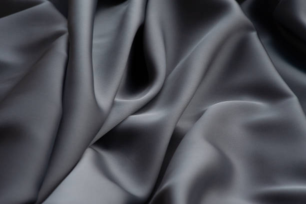 istock grey silk fabric.This grey satin fabric is perfect for making fabric 1327881616