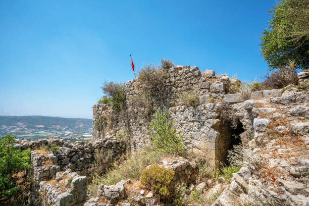 istock Panoramic view of Alara river and Alara Castle, which had the function to safeguard the caravans from holdup robberies that were stopping over at the last caravanserai Alarahan on the Silk Road 1327885792