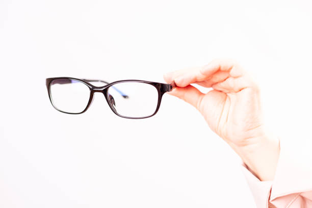 istock vision problems, selection of glasses with diopters, white background 1327891906