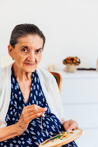 istock Portrait Of A Smiling Old Woman While Ties 1327894044
