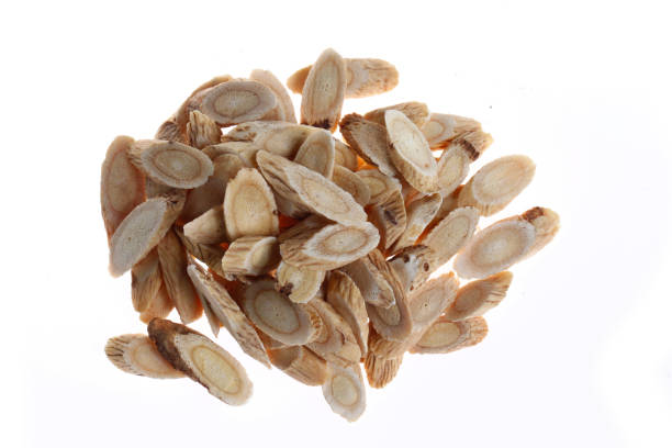 istock Chinese herbal medicine astragalus membranaceus on a white backg 1327900794