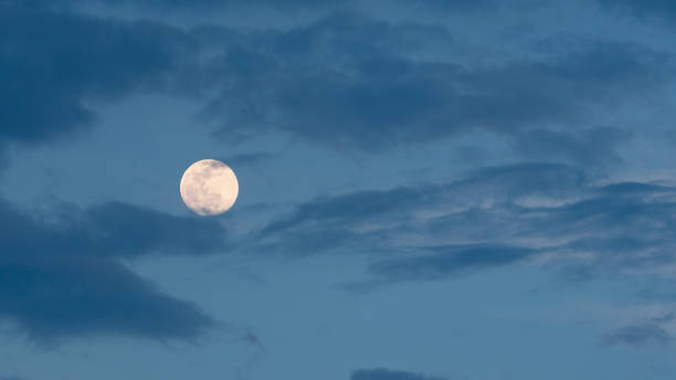 istock Full moon and night space with a large full moon. 1327905547
