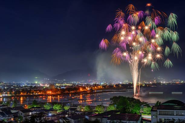 Summer fireworks festival of Okaya city in Nagano prefecture, Japan. This is a summer fireworks festival of Okaya city in Nagano prefecture, Japan.
There are many fireworks festivals in Nagano prefecture, many people come to see this beatufiul scenery every summer season. suwa lake photos stock pictures, royalty-free photos & images