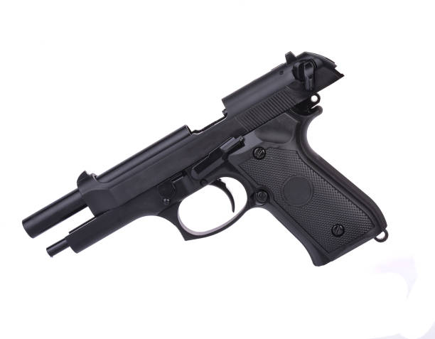 istock Semi automatic 9 m.m handgun pistol isolated on white background 1327909699