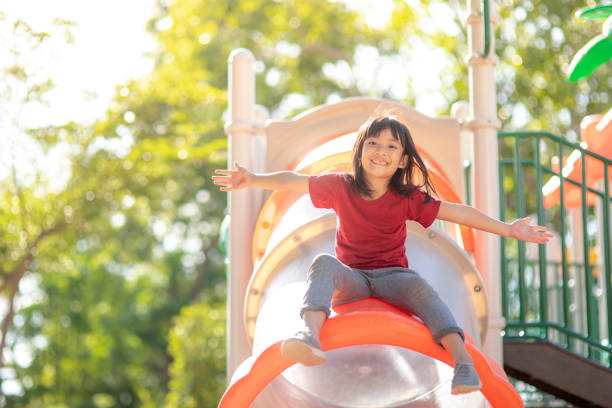 istock Active little girl on playground 1327912253