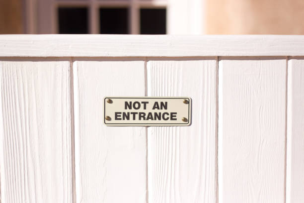 istock Sign on Gate Reading NOT AN ENTRANCE 1327913001