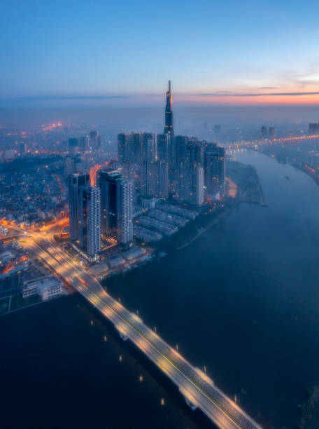 Landmark 81 in foggy morning Drone view Landmark 81 in Ho Chi Minh city, Southern Vietnam ho chi minh city stock pictures, royalty-free photos & images