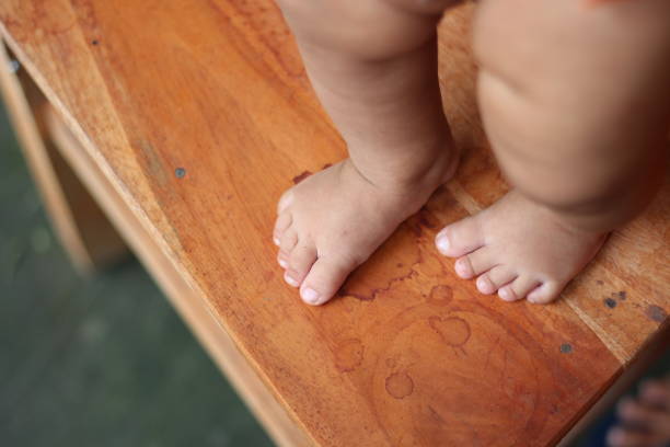 istock A small baby has two legs 1327915727