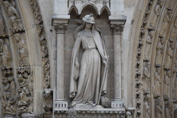 istock Statue of Saint between Two Gothic Arches 1327918920