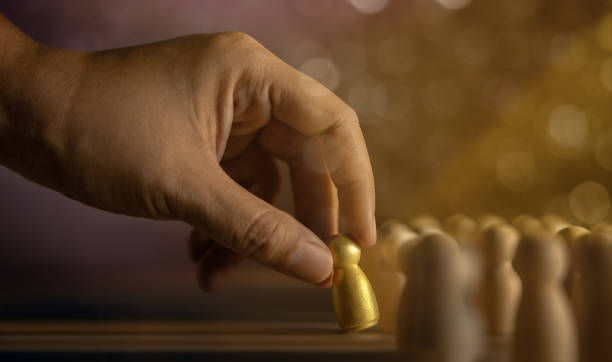 istock Talent, Human Resources Concept. Stand Out from the Crowd. Hand Picked a Different and Individual Unique Person 1327919663