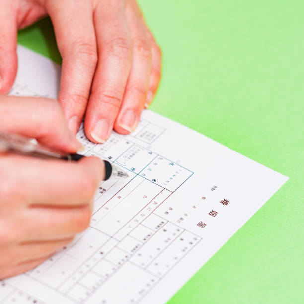 istock Japanese person write a marriage certificate 1327931892