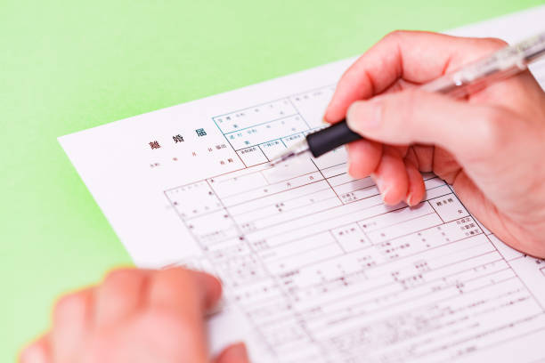 istock Japanese person write a divorce notice 1327934691