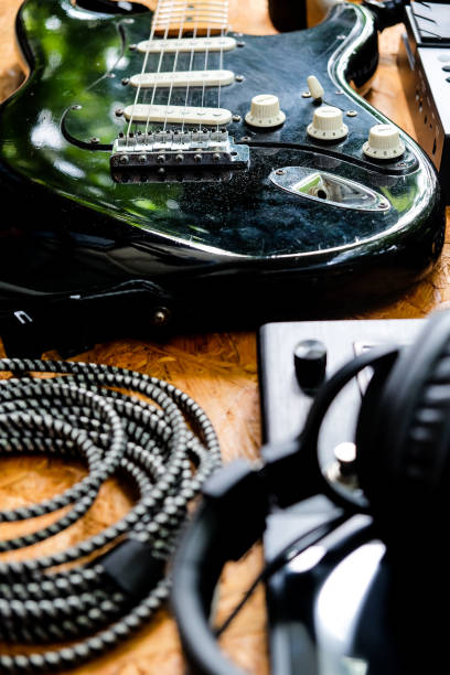 istock Guitar and music studio equipment 1327935959
