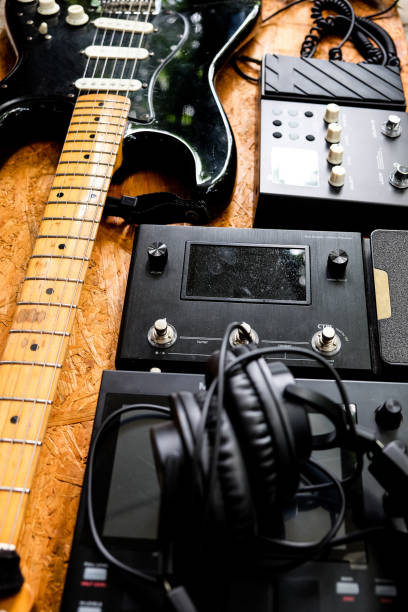 istock Guitar and music studio equipment 1327935970