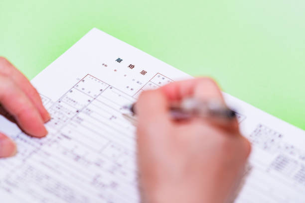 istock Japanese person write a divorce notice 1327936639