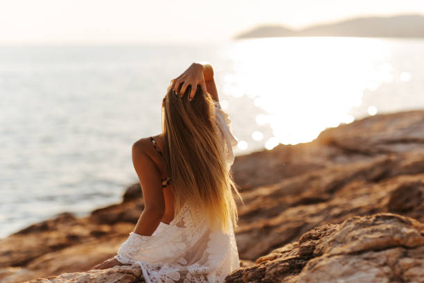 istock Daydreaming on the rocky beach 1327938021