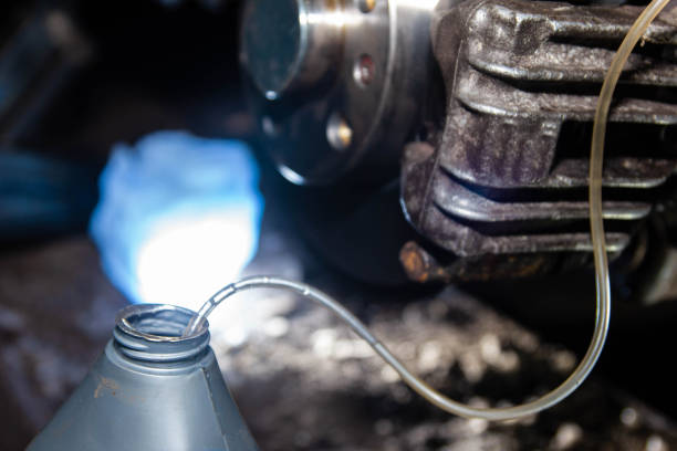 istock bleeding the brake hydraulic system, hose from the caliper, changing the brake fluid. 1327939730
