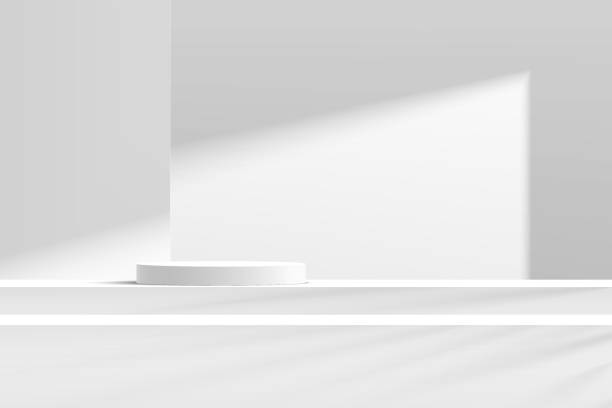 istock Abstract 3D white and gray cylinder pedestal podium on the steps table with white wall scene in shadow. Modern vector rendering geometric platform for cosmetic product display presentation. 1327940008