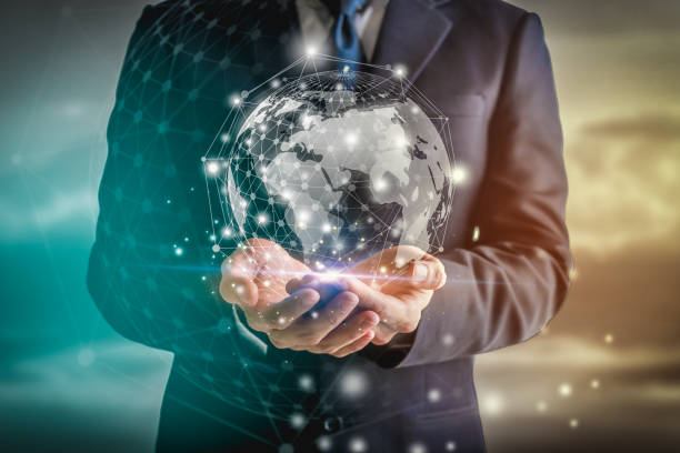 istock Businessman hands holding earth and global networking connection. Global communication network concept. 1327941352