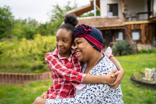 istock A family hug in the back yard 1327949189
