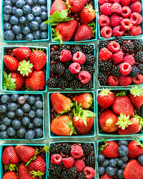 istock Organic berries, different varieties from the market. 1327950948