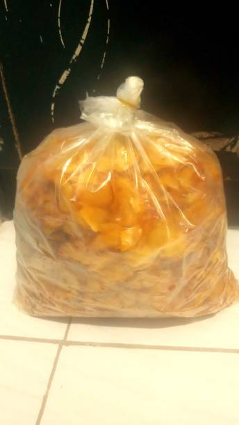 istock Cassava chips that have been seasoned and put in plastic 1327952486