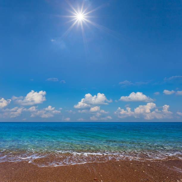 istock emerald sea with sandy beach at the sunny day 1327958229